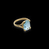 Anello in oro giallo 18kt e topazio celeste