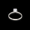 Anello solitario in oro bianco 18kt con montatura a V