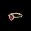 Anello fiore in oro giallo 18kt con zirconi bianchi e rossi.