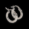 Orecchini in oro bianco 18kt a cerchio con lavorazione