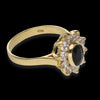 Anello in oro giallo 18kt a margherita con zirconi blu bianchi