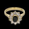 Anello in oro giallo 18kt a margherita con zirconi blu bianchi